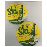 2 cardboard Drink Ski advertising hangers