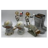 space themed cow figures, lamp, snow boots, etc.