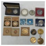 space theme coins and tokens, some silver