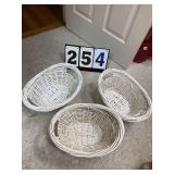 3 WICKER BASKETS IN MASTER CLOSET