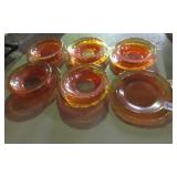 carnival glass bowls and saucers .