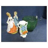 ceramic figurines and green glass