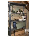 Metal shelf with miscellaneous items