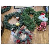 Three Christmas wreaths&one strand of garland