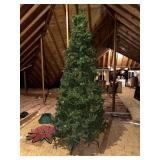 10 foot Christmas tree with attached pinecones