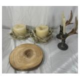 Four antler candle decor pieces and wooden board