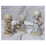 4 precious moments figurines