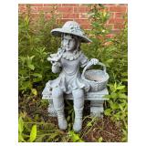 Cute poly resin garden yard art with girl on bench……bottom of basket is broken…..approx. 20w x 12 tall