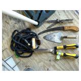 Variety of garden tools and a 75’ XHOSE PRO (condition unknown)