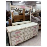 Pink and white dresser