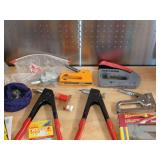 Staple guns, rivet tools, and staples