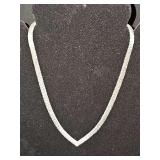 Sterling silver v-neck necklace. 24.6 grams and 17 in long.