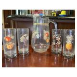 Vintage set of fruit motif pitcher with 8 glasses…..pitcher is 10-1/4 tall, each glass is 6-1/2 tall…..there are 2 matching of each glass