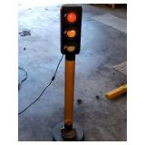 Stop light Plastic coin bank, lights up, 44" tall