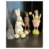 Selection of various height and material rabbits, eggs and other