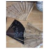 Antique lace and silk hand fans. Lace is aged but otherwise fine. Black silk has come apart except where painted could be framed, and silk with Mother of Pearl is beginning to come apart could be fram