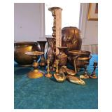 Grouping of brass/brass like items used as props in Anne Enochs art classes