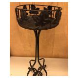 Black metal plant stand. 26”H. 12” base. 8.25” diameter. Needs a little TLC.