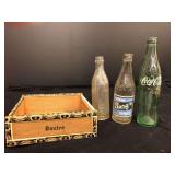 Vtg glass soda bottles and vtg wooden cigar box with no lid labeled DANTES. 1 Memphis orange crush,1 Barq’s, and 1