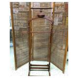 Wood valet stand/suit rack. Brown. 46.5”H x 16.5” W x 16.5” D. Does not include room divider.