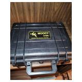 Mooch Protector series case, hard exterior, padded interior. Will fit a hand gun. Hole for lock