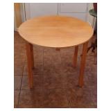 Small wooden dinette drop leaf table.