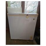 Small GE chest freezer model FCM5DMCWH CONTENTS NOT INCLUDED...