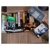 Box full of VHS tapes: MASH, Walt Disney, and so many more