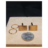 Pair of 14K gold cufflinks and 2 small 14K gold rings(I believe these may have come off of another piece of jewelry) 10.9 grams...