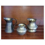 Brass grouping: 4.5" Colonial style pitcher, 4" pitcher, and 3" mini spitoon