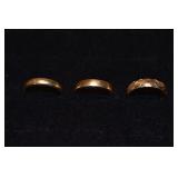 Three 14kt yellow gold wedding bands, 12.4 grams t