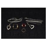 10kt gold lot: heart pendant prong set with 9 grad