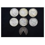 6 US Peace silver dollar coins and one 20g partial