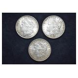 3 US Morgan Philadelphia Mint silver dollar coins: