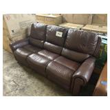 Brown leather sofa w/ reclining ends