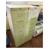 2 tall metal file cabinets