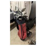 Golf clubs with golf bag and cart