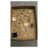 Lot of pins and charms etc. Most are Sterling