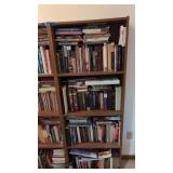 Two bookcases with books. Most are religious