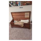 West Branch cedar chest linens. Pictures on wall