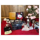 Radios office supplies, clock, artificial flowers