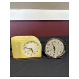 Alarm clocks yellow one does have crack