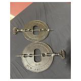 Two Griswold 9 inch stove dampers