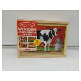 New Melissa & Doug wooden jigsaw puzzles in a box