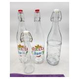 NEW Lot of 4 Glass Bottles w/ Tops