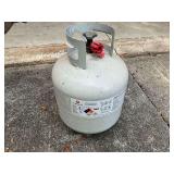 Full 20 lb. propane tank.