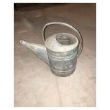 Galvanized water can