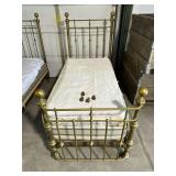 Brass twin beds, with casters