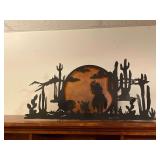 Steel southwestern cowboy scene with light