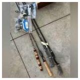 Four fishing rods and two reels
